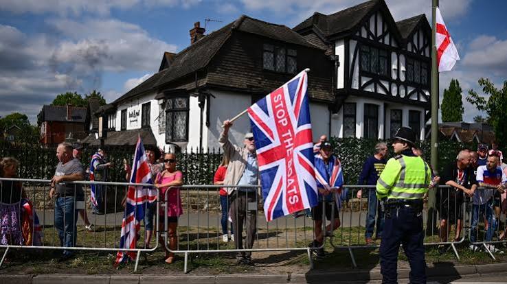 Scuffles, arrests as protesters across UK rally against asylum hotels