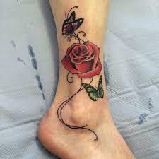 Rose And Butterfly Ankle Tattoo Done By Travis Allen At Twisted Tattoo Yaxley Ww Butterfly Ankle Tattoos Rose And Butterfly Tattoo Butterfly Tattoos For Women