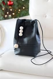 Make sure the colors of the throw coordinate with the leather seating works in darker rooms as well. You Can Create A Trendy Bucket Bag From An Old Leather Jacket That 39 S Been Hanging Around Your Closet Collecti Diy Leather Bag Bucket Bag Bucket Bag Pattern
