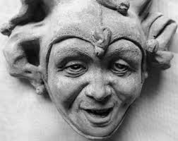 Joking Jester, una divertida escultura de pared de Joker de piedra fundida 