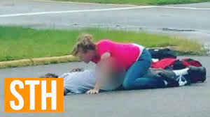 Woman Sexes Up Passed Out Man In Public Parking Lot In Broad Daylight