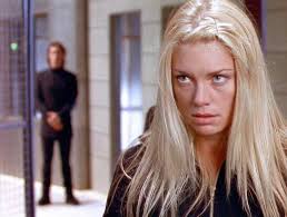 Nikita with Michael standing in the background...