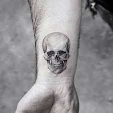 70 Simple Tattoos For Men Wrist Tattoos For Guys Small Skull Tattoo Small Tattoos For Guys