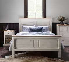 Bedrooms with walls clad in reclaimed wood have a certain sense of tranquility, an inviting aura, and natural charisma that sets them apart from the mundane. Hart Reclaimed Wood Bed Wooden Beds Pottery Barn