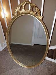 A vintage rectangular mirror in an ornate gold gilt frame from the carolina mirror company. Authentic Antique Carolina Mirror Company Gold Oval Mirror For Sale In Phoenix Az 5miles Buy And Sell