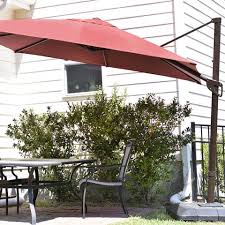 The size of your outdoor umbrella will determine the weight and design of the base needed to keep the umbrella upright and steady on your patio or deck. Royal Garden Cantilever Outdoor Patio Umbrella Review