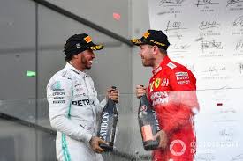 Lewis Hamilton Mercedes Amg F1 2nd Position And Sebastian Vettel Ferrari 3rd Position Celebrate On The Podium