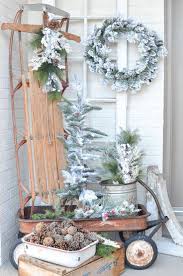 Using white decor for christmas made transitioning to winter. Simple Farmhouse Winter Porch Front Porch Christmas Decor Rustic Winter Decor Christmas Porch Decor