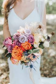 Blue purple and orange flowers. Trending Wedding Ideas From Volume 14 Yellow Wedding Bouquet Purple Wedding Bouquets Orange Wedding Bouquet