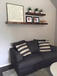 Get tips for arranging living room furniture in a way that creates a comfortable and welcoming environment and makes the most of your space. Wood Floating Shelves Primitive Shelf Floating By Kprimitivecrafts Floating Shelves Living Room Bookshelves In Living Room Living Room Shelves