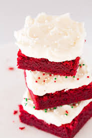 Beat sugar, sour cream, butter, eggs, red food coloring, and vanilla together in a bowl. Red Velvet Brownies With Fluffy Cream Cheese Frosting Cooking Classy