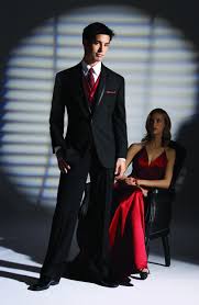 Black And Red Prom Tux Black Tuxedo With Red Tie Google Search Prom Tuxedo Wedding Suits Tuxedo Wedding