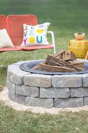 This elegant brick fireplace helps ground this large outdoor space while keeping guests cozy. 31 Diy Outdoor Fireplace And Firepit Ideas