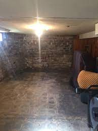 Basements don't have to be dingy dungeons suitable for nothing but storage. Dingy Basement Made Dry Warm In Davenport Ia Midamerica Basement Systems