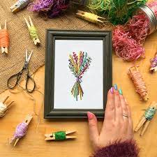 I have chosen to use it as a wall display, framing it with a wooden embroidery hoop. Upcycled Embroidered Wall Hanging Perennial