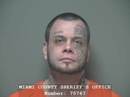 Woman held against will at Piqua home, police say