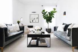 How The Everygirl Co Founder Styled Her 950 Square Foot Chicago Home Black And White Living Room Living Room Spaces Monochrome Living Room