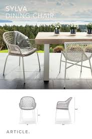 A Modern Beauty The Sylva Rests On A Slim Curved Aluminum Frame And Features A Knotted Patte Modern Outdoor Dining Chairs Dining Chairs Outdoor Dining Chairs