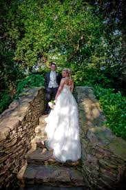Stone Bridge And Greenery Surround This Bride And Goom Wedding Venues Long Island Wedding Photography And Videography Long Island Wedding
