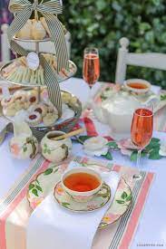 A properly set afternoon tea table setting should not be a daunting task. Host An English Style Afternoon Tea Lia Griffith English Tea Party Tea Party Food Tea Party Table Settings