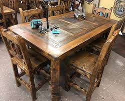 Available in a range of sizes, our kitchen and dining room tables can seat as few or as many as you like—from the cozy table tucked in the corner of your kitchen to the extension table with leaf that easily seats up to ten guests. Texas Rustic Wood Furniture Tooled Leather Custom Furnishings Rustler S Junction
