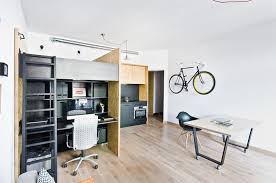 Even if your small apartment feels cramped, there's no reason to let it cramp your style! Built In Brilliance Clever Live Work Studio Design Conceals A Secret Room Designs Ideas On Dornob