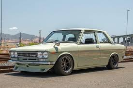 Image result for Apple Green 1958 Datsun