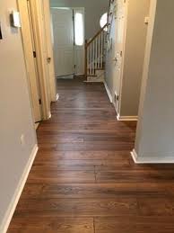 Pergo Timbercraft Wetprotect Waterproof Valley Grove Oak 7 48 In W X 4 52 Ft L Embossed Wood Plank Laminate Flooring Lowes Com In 2020 Waterproof Laminate Flooring Flooring Laminate Flooring