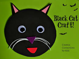 Use pom poms to count while reading ten black dots, from 3 dinosaurs. Black Cat Craft