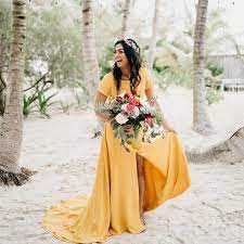 Bride In A Colorful Golden Yellow Wedding Dress For Casual Beach Wedding Yellow Wedding Dress Wedding Dresses Yellow Wedding