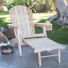 Natural Unfinished Fir Wood Adirondack Chair With Retractable Ottoman And Drink Holder Wood Adirondack Chairs Rustic Outdoor Furniture Rustic Furniture