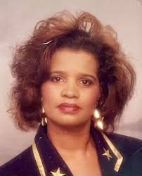 Can someone remove scratches from an old photo?