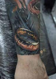 Explore cool ideas from one ring to gandalf and more. One Ring Tattoo Jpg 590 830 Ring Tattoos Lord Of The Rings Tattoo Geek Tattoo