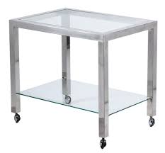 Glass table tops can protect your furniture from scratches and possible damage. Sold Price A Glass And Steel Side Table With Wheels July 2 0120 6 00 Pm Cest