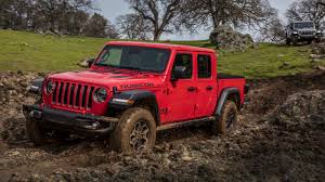 The gladiator wears unmistakable styling and borrows from the parent company's corporate parts bin to add the structure needed for a pickup bed. 2020 Jeep Gladiator Marked Up At Dealers 10 000 20 000 Over Msrp Autoblog