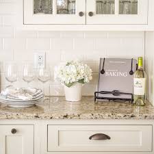 Giallo Ornamental Granite With Off White Subway Tile Off White Grout And Off White Cab White Kitchen Backsplash Off White Cabinets Granite Countertops Kitchen