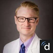 Dr. Adam L. Carrera, MD