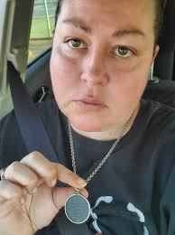 Y'all see this necklace? My daddy wore it for years, it's a guardian angel  necklace with a scripture. He wore it so much the angel and scripture has  worn off but you