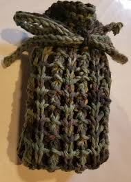 Here's the pattern for the washcloth pictured below: Ravelry Knitted Cotton Soap Saver Pattern By Marianna Mel
