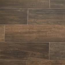 American Olean Woodland Hills Walnut 6 In X 24 In Glazed Porcelain Wood Look Floor And Wall Tile Lowes Com Porcelain Flooring Porcelain Wood Tile Porcelain Wood Tile Bathroom