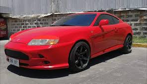 Image result for Sunny Yellow 2003 Tiburon