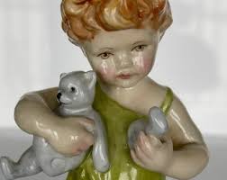 Wednesday’s Child by Freda Doughty for Royal Worcester 1958
