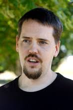 Police remove computers, boxes from Powell home