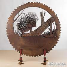 Note how i turned the blade upside down to have the saw teeth look like grass. Metal Art For Animal Park In France Artist Cindy Chinn