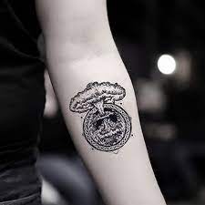 He decided to open tattooagogo. Amazon Com Atom Bomb Temporary Fake Tattoo Sticker Set Of 2 Www Ohmytat Com Beauty Personal Care
