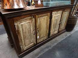 Turn old thrifted cabinet doors into a command center or art station with dry erase paint, cork, and chalkboard paint. Wood Cabinet Sideboard This Cabinet Is Made With Four Reclaimed Doors The Dark Frame Contrasts The Light Doors For Added Interest Features Inner Shelves For Storage Perfect In Any Room