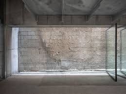 Bahrain S New Exhibition Space Showcases The Architectural Heritage Of The City Ignant Concrete Structure Architecture Concrete Interiors