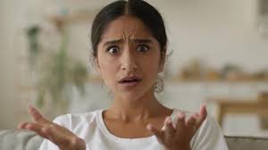 Confused guy with a pigeon mask puts his...