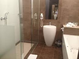 Save up to 70% online at modern bathroom, browse our collection of bathroom vanities, faucets, sinks, showers, tubs and more! Large Modern Bathroom With Bath And Shower Picture Of Van Der Valk Hotel Den Haag Nootdorp Tripadvisor