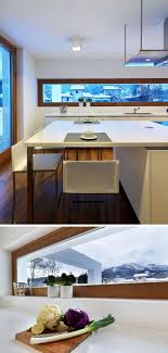 Backsplash height should be all the way from the countertop to the bottom of upper cabinets. 12 Inspirational Examples Of Letterbox Windows In Kitchens Home Decor Kitchen Kitchen Window Contemporary Kitchen